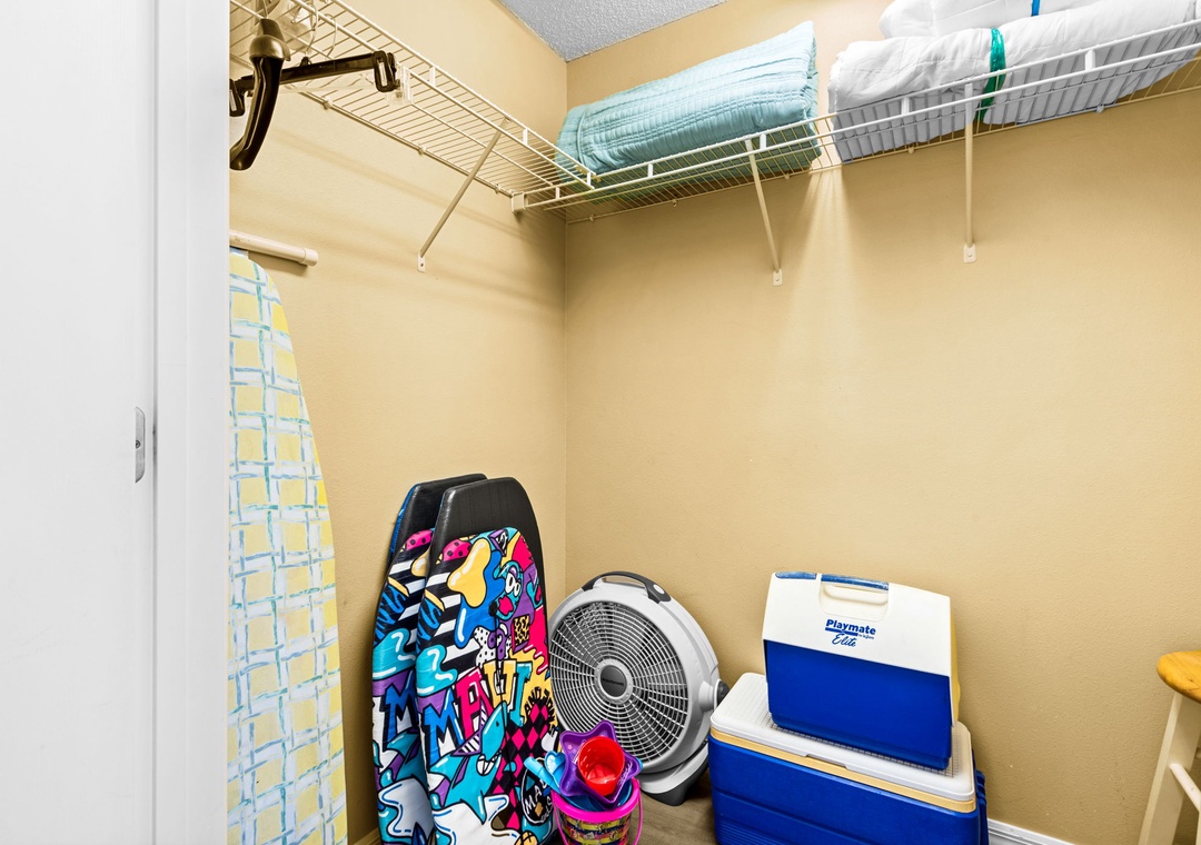 Beach equipment in the primary bedroom walk-in closet