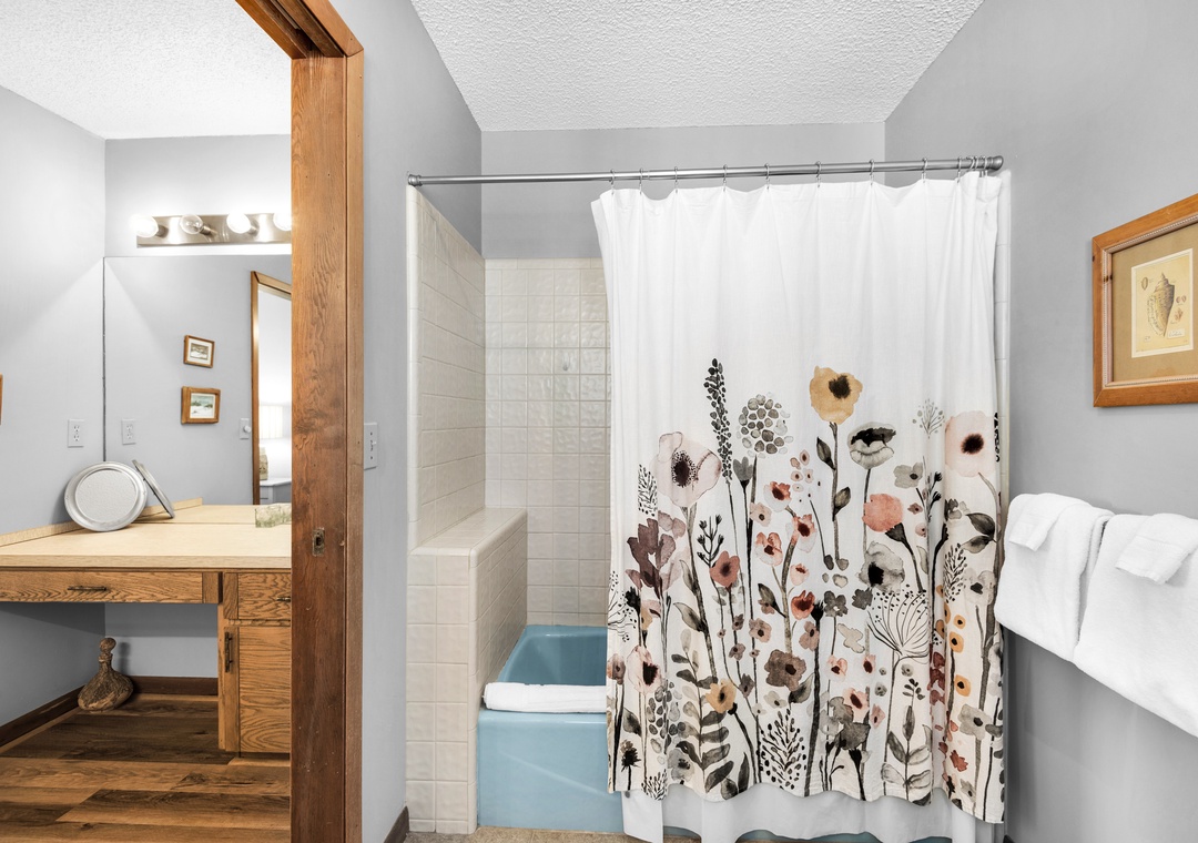 Second floor primary ensuite bathroom with shower/tub combo