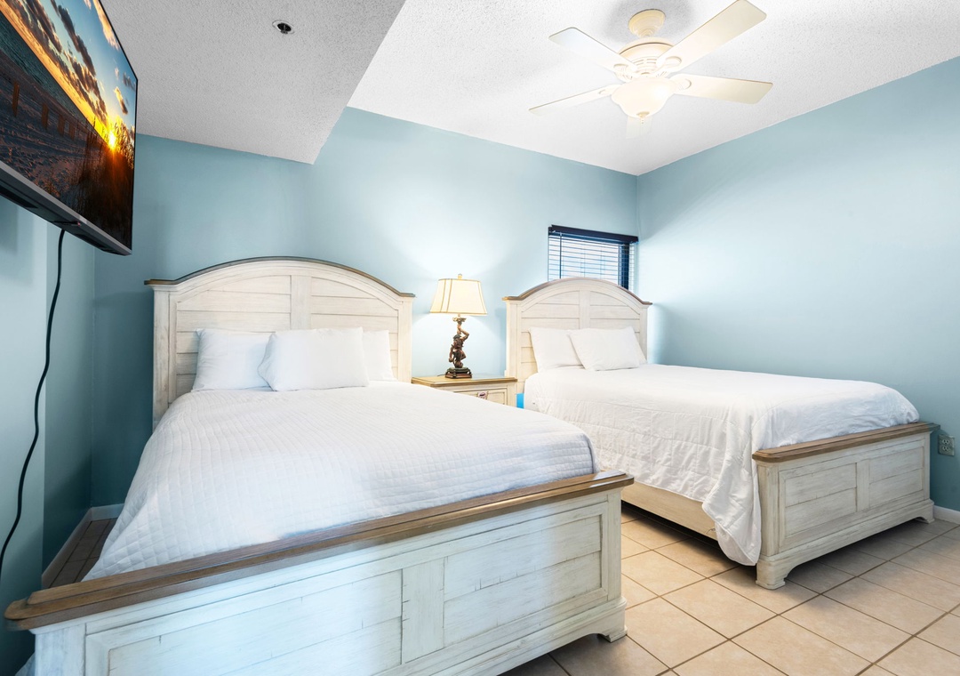 Two queen beds in the guest bedroom