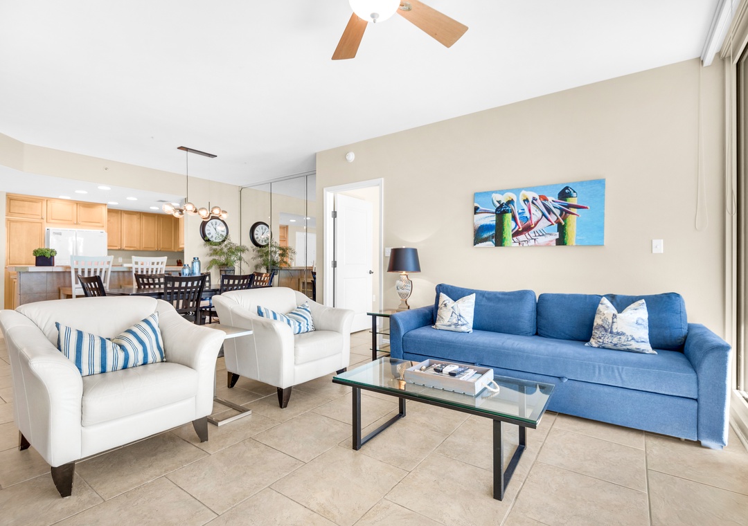 Living room is equipped with a sleeper sofa