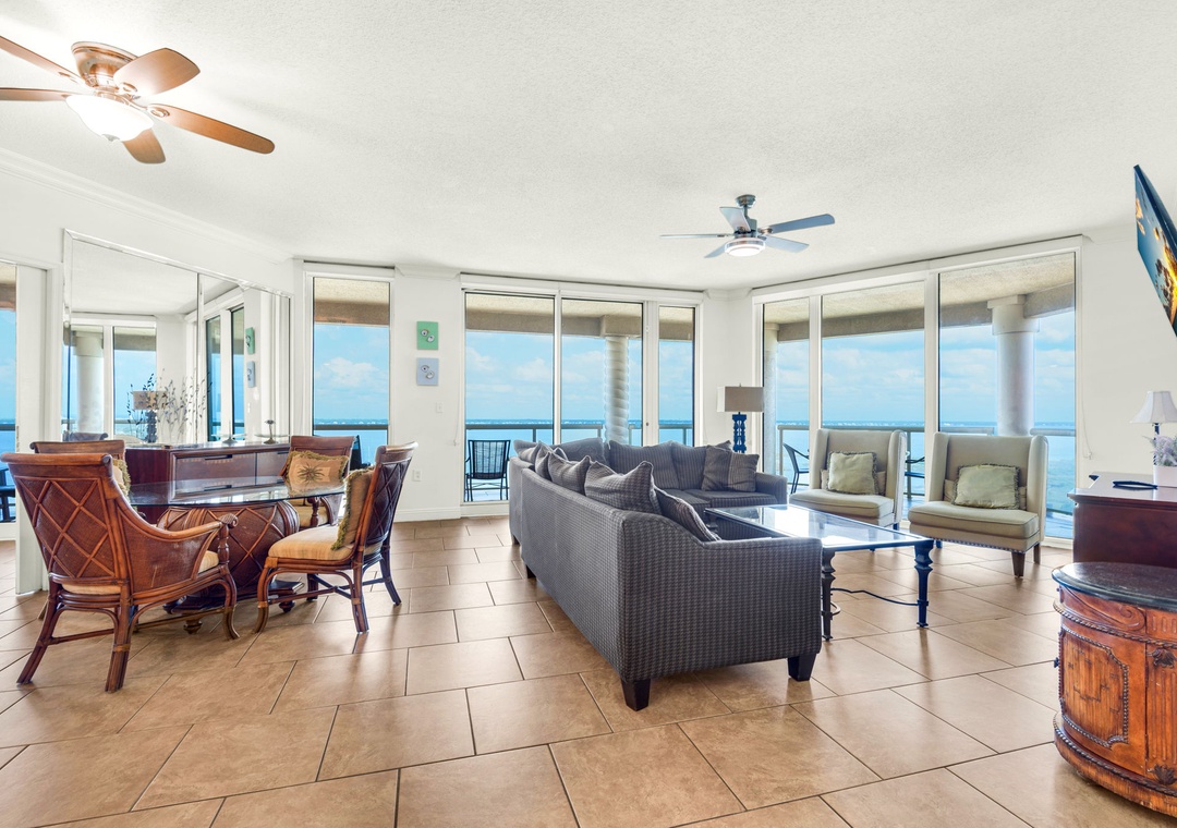 Spacious living area with panoramic water views