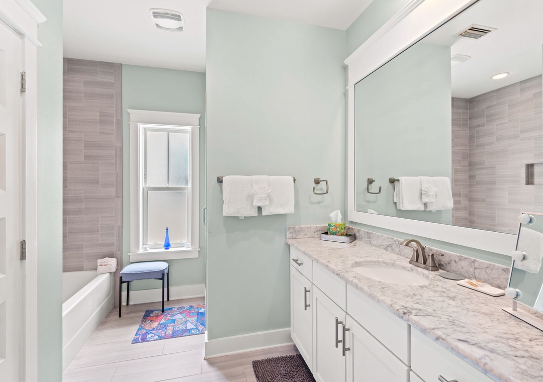 Second floor guest bathroom with bathtub