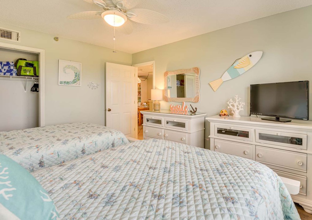Guest bedroom with two queen beds