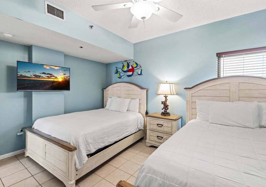 Two queen beds in the guest bedroom