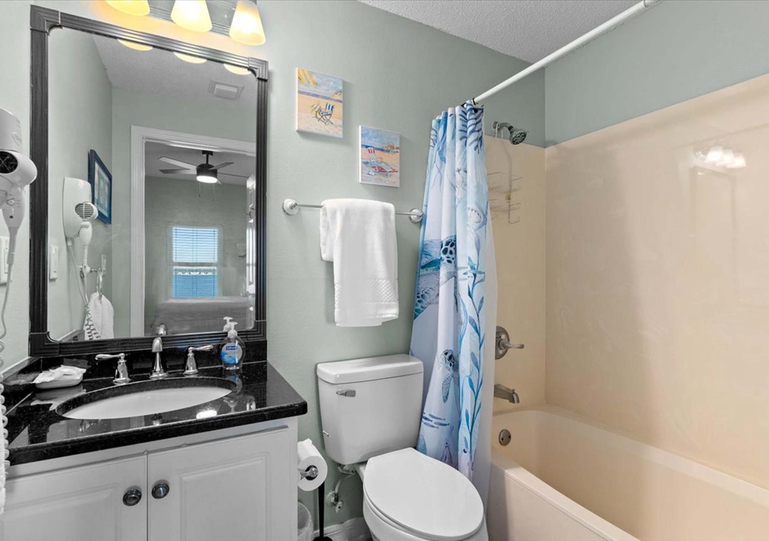 Guest bathroom 1 with shower/tub combo