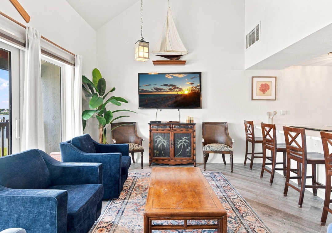 Spacious living area with large flat-screen TV
