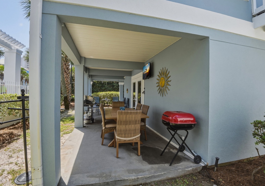 Covered patio with charcoal grill