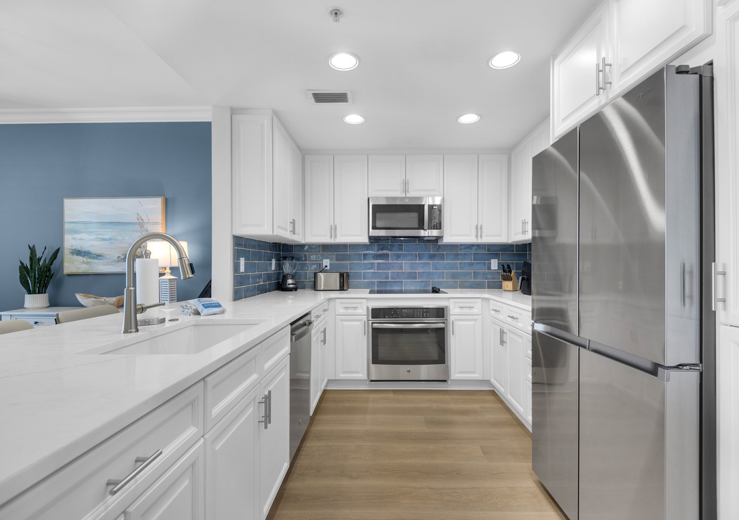 Full kitchen with stainless steel appliances