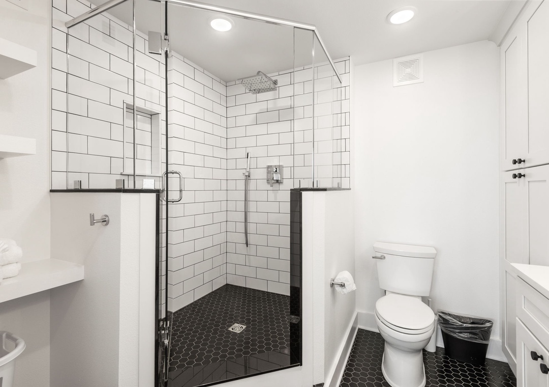 Primary ensuite bathroom with large walk-in shower