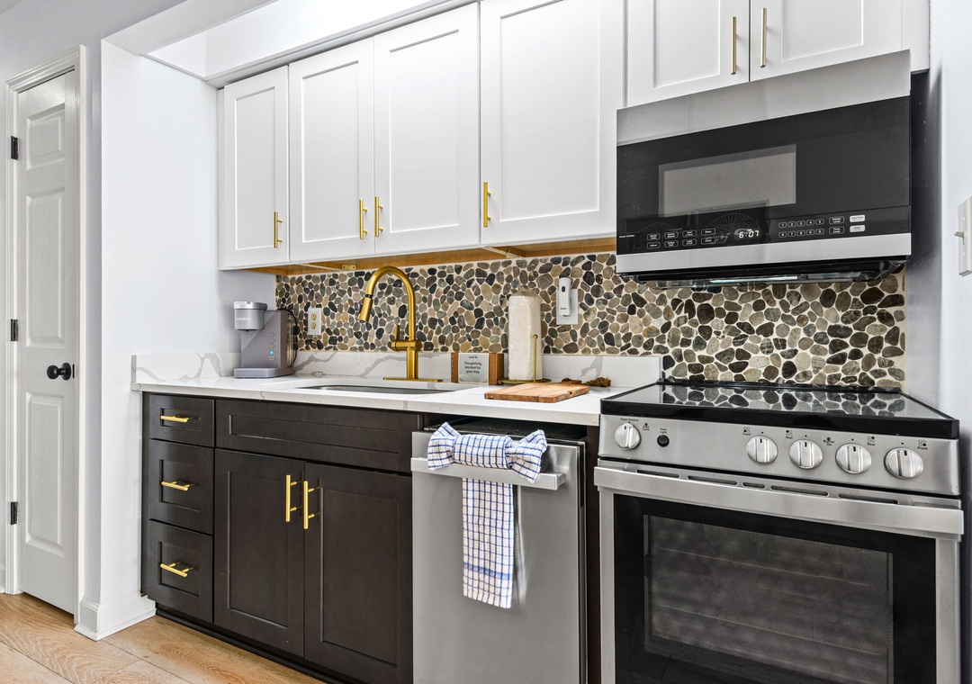 Full kitchen with stainless steel appliances
