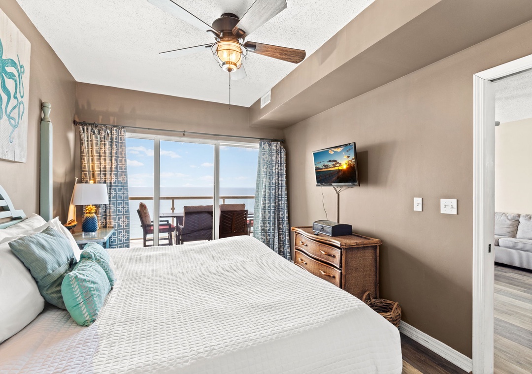 Primary bedroom with balcony access