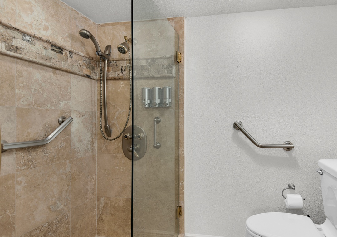 Fully tiled shower in guest bathroom 1