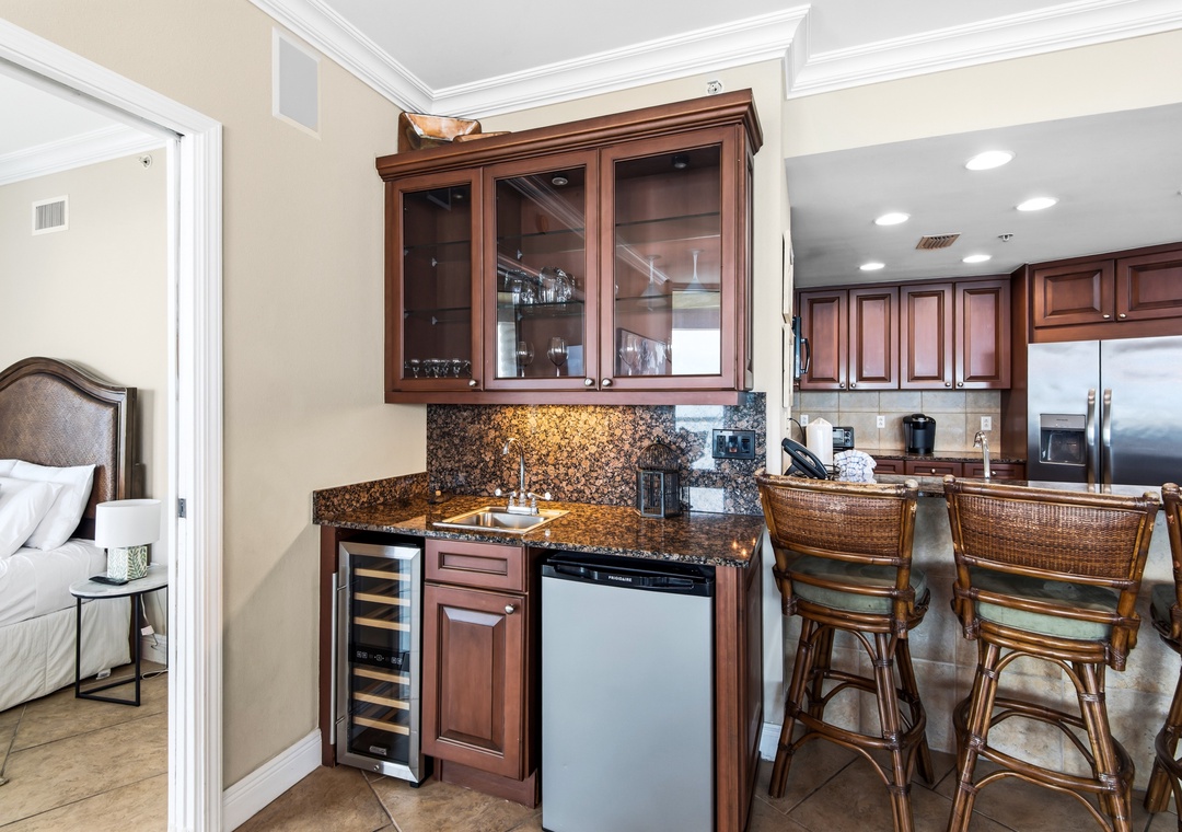 Wet bar with ice maker and wine refrigerator