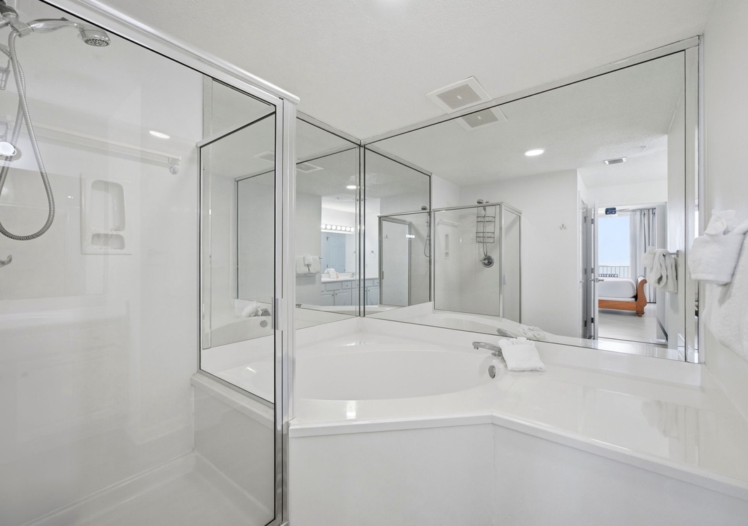 Garden tub and walk-in shower in the primary bathroom