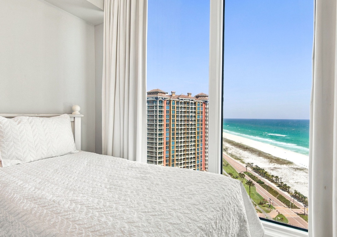 Guest bedroom with floor-to-ceiling Gulf views