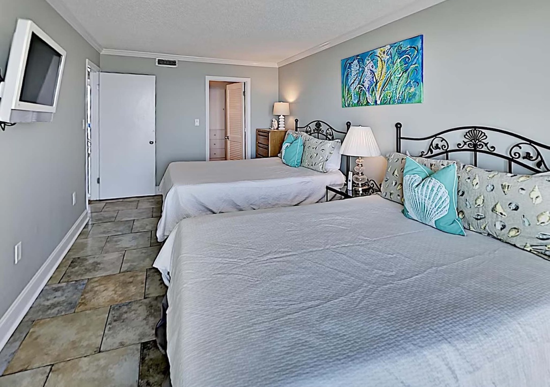 Guest bedroom with two queen beds