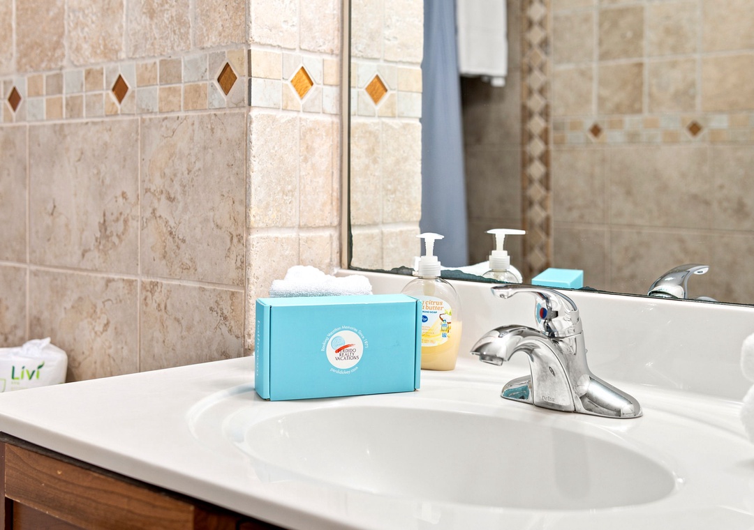 Ocean Breeze W 105- Step into your well-appointed bathroom with beautifully tiled walls, a spacious vanity, and all the essentials you need for a refreshing start to your day.