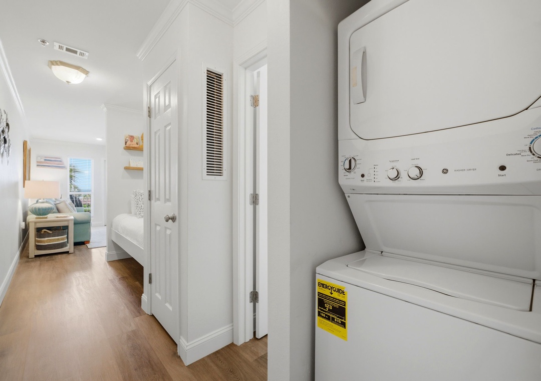 Grand Caribbean 305W- Your in-unit laundry makes beach days effortless—toss towels in before heading out and come back to fresh linens ready for your next adventure.