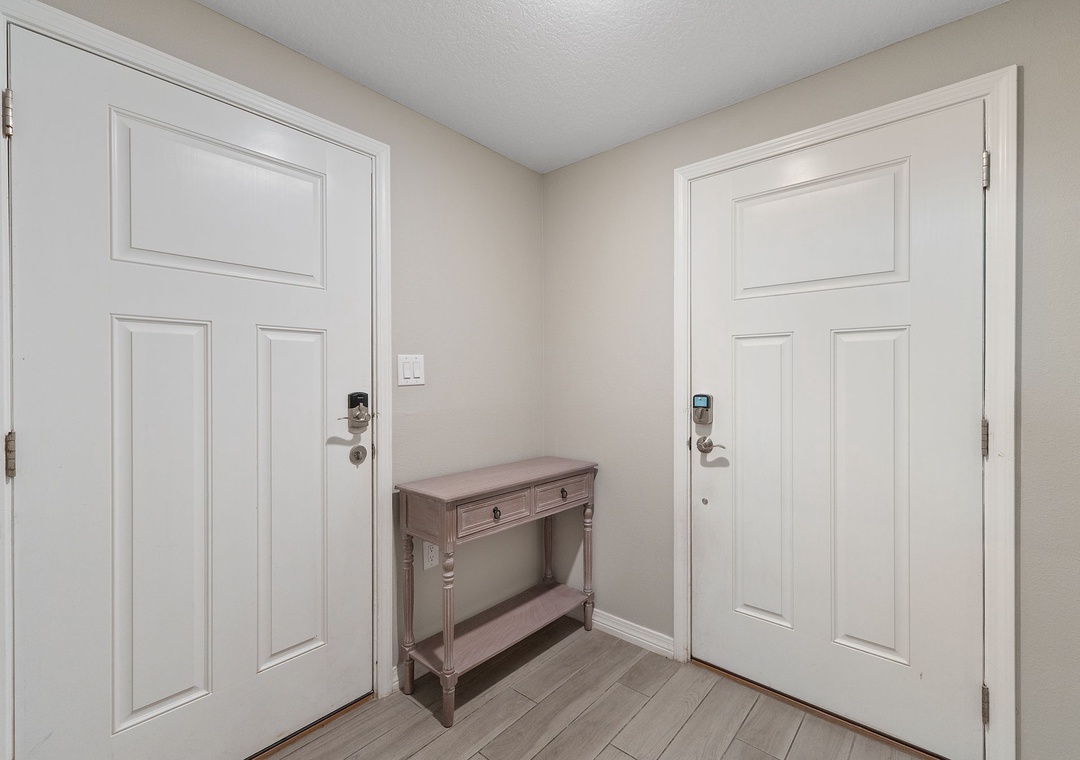 Saltwater & Sunsets- Step into your private retreat through this bright, welcoming entryway where soft neutral tones and modern conveniences set the tone for your stay.