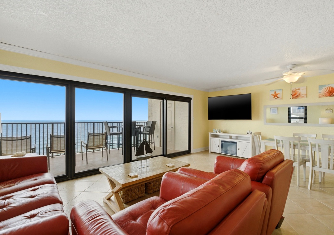 Ocean Breeze E601- Step into your bright coastal retreat where ocean breezes and stunning sea views await through expansive glass doors. Sink into plush seating while you enjoy the seamless indoor-outdoor flow to your private balcony overlooking the water