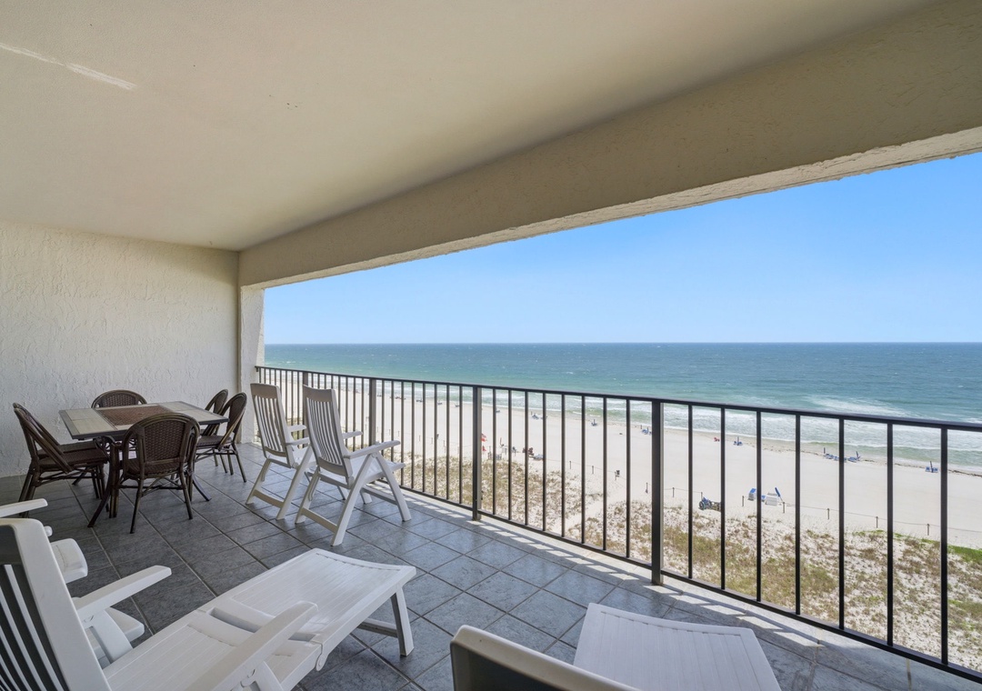 Shipwatch D803- The expansive balcony overlooks pristine white sand beaches and turquoise waters stretching to the horizon. Your personal lounge chairs and outdoor dining table await sunny mornings and breezy coastal evenings.