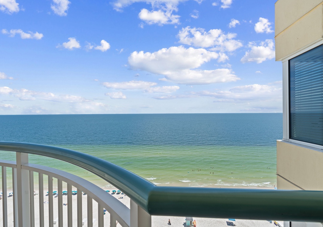 Beach Colony T15B- The expansive Gulf stretches endlessly from this high-rise balcony, framing your private perch above the shore. Morning coffee with this panorama makes every day feel like an escape.