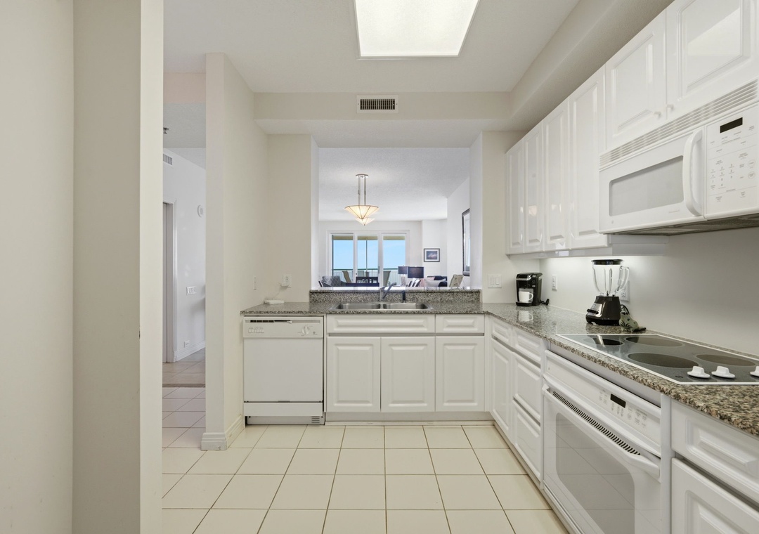 Beach Colony West 15C- Kitchen View to Living Room & Balcony