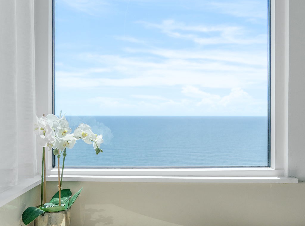 Beach Colony T14B- Soak in your private tub while gazing out at endless blue horizons—this serene ocean view turns every bath into a peaceful escape.