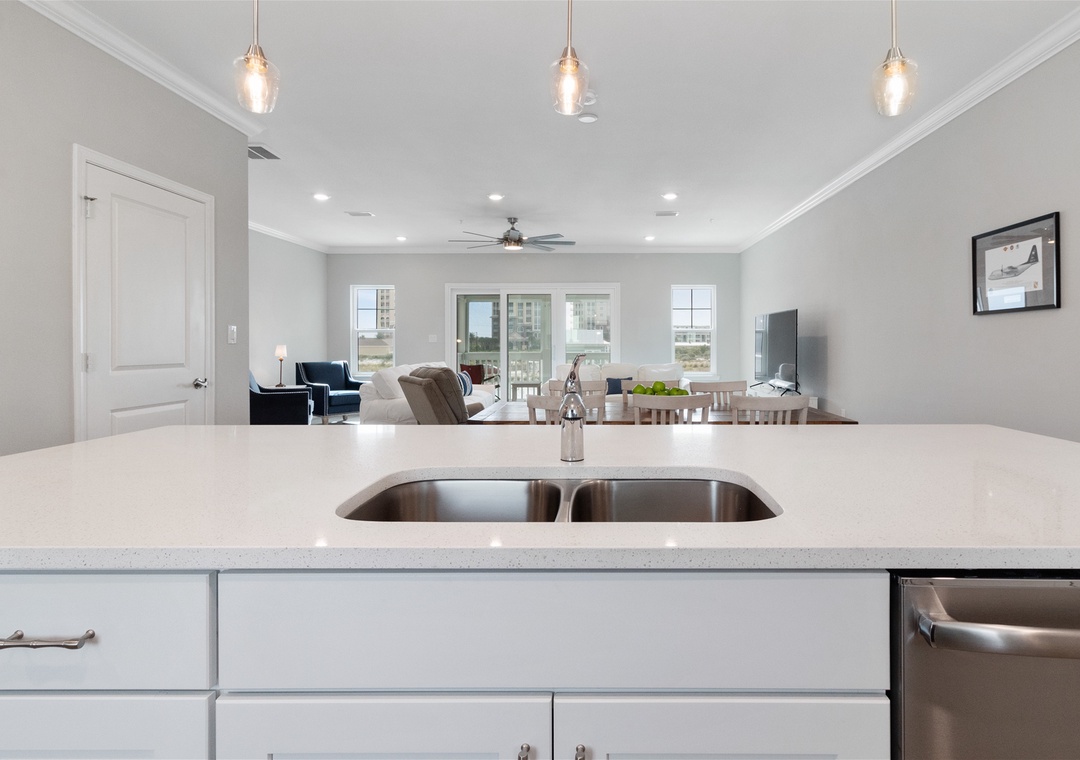 Lost Key Sea-130 Kitchen Sink and Counter Looking over Living Room
