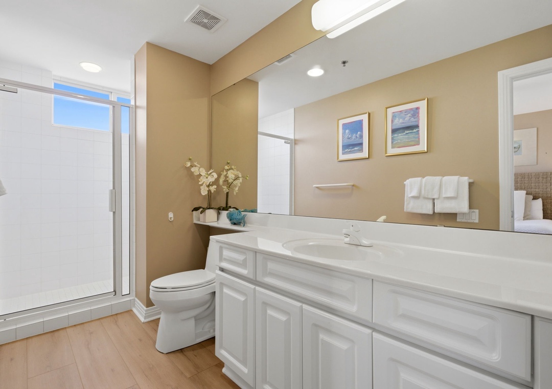 Beach Colony T PH1D-Your private bathroom features a spacious walk-in shower, generous counter space, and thoughtful touches that make freshening up a pleasure.
