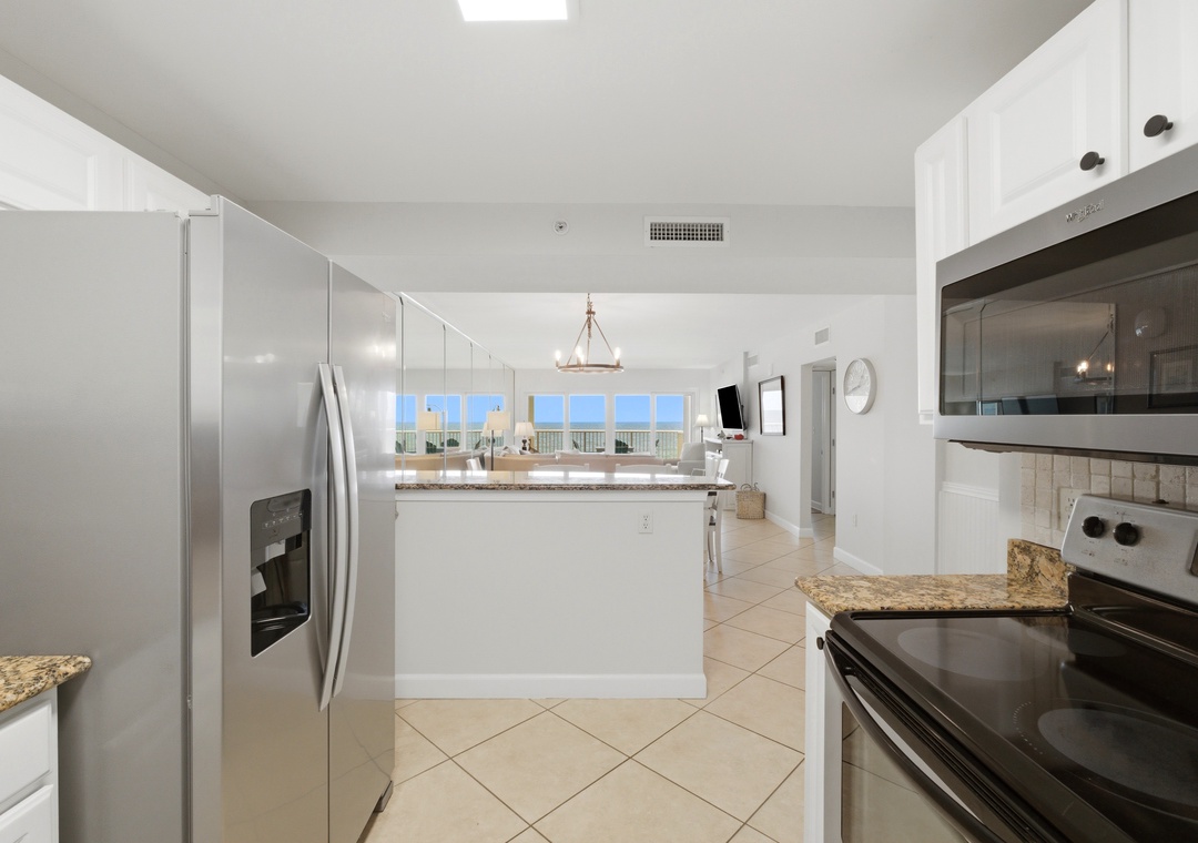 Sandy Key 318- You'll love preparing meals in this bright, spacious kitchen with modern appliances and stunning ocean views framing every moment, creating a serene coastal retreat.