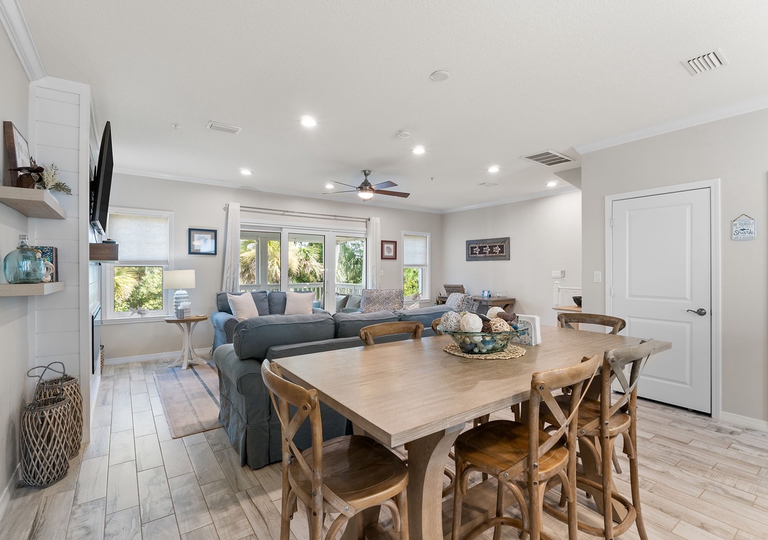 Turtles Nest- Step into your home away from home—a breezy open layout where dining and lounging blend seamlessly, light floods through wide windows, and coastal touches invite you to unwind in effortless comfort.