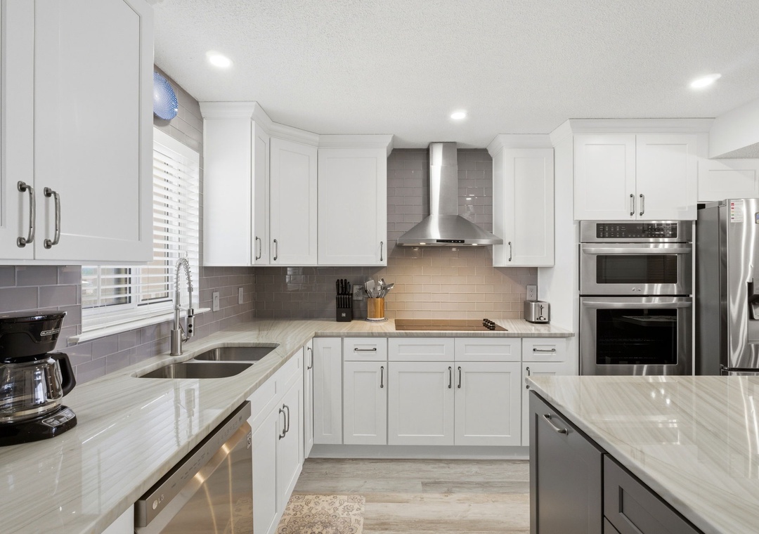 Your fully-equipped modern kitchen features gleaming countertops, stainless appliances, and everything you need to prepare delicious meals during your stay.