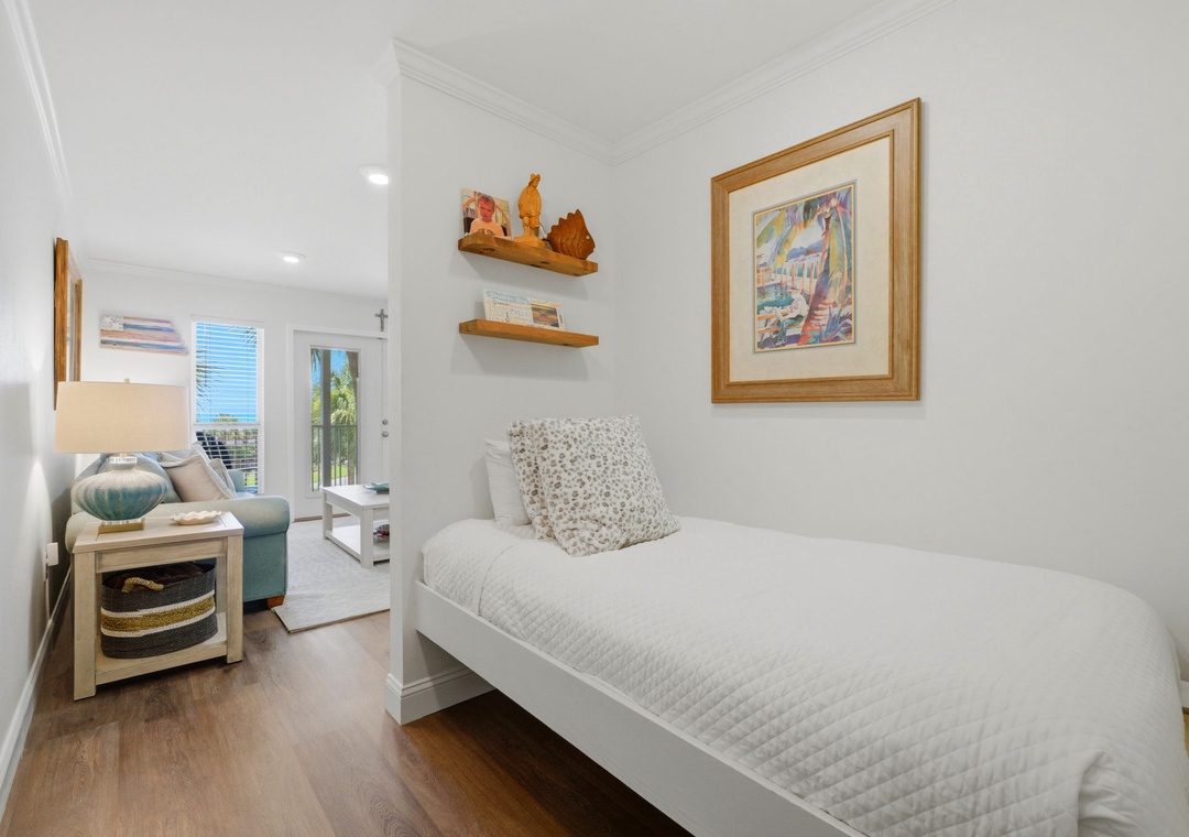 Grand Caribbean 305W- Cozy twin bedroom with coastal-inspired decor and plush bedding invites restful nights, while the open layout flows seamlessly into your bright living space.