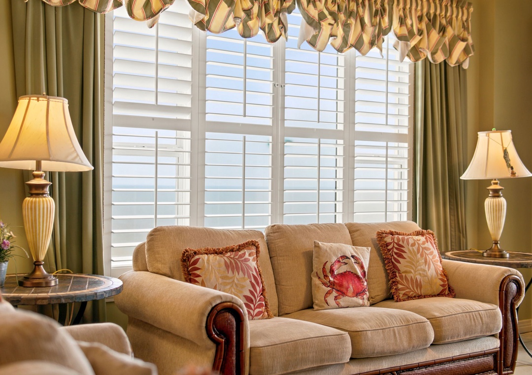Settle into plush coastal elegance with warm lighting, inviting seating, and charming seaside accents. Your perfect retreat for relaxing after exploring the area.Beach Colony W13A-