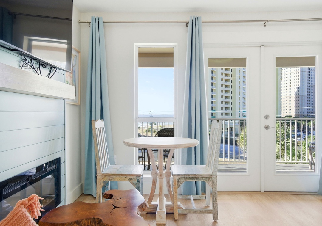 Grand Caribbean 411W- Sitting Area in Living Room & Balcony View