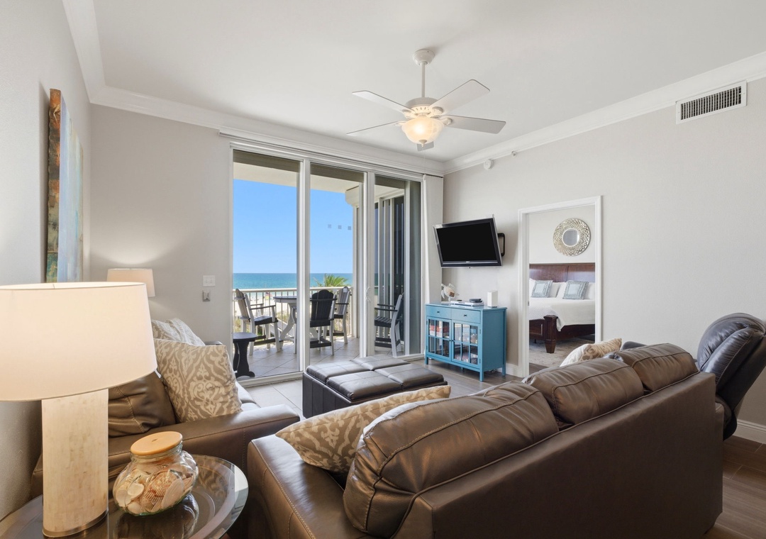 Sink into plush leather seating while gazing at your private ocean view—a coastal retreat where every moment feels like vacation. Your balcony beckons with sea breezes and the sound of waves.