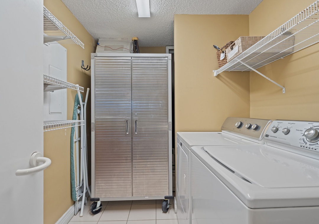 Beach Colony T15B- Your in-unit laundry room means fresh towels and beachwear anytime—ample shelving keeps everything organized and within reach.