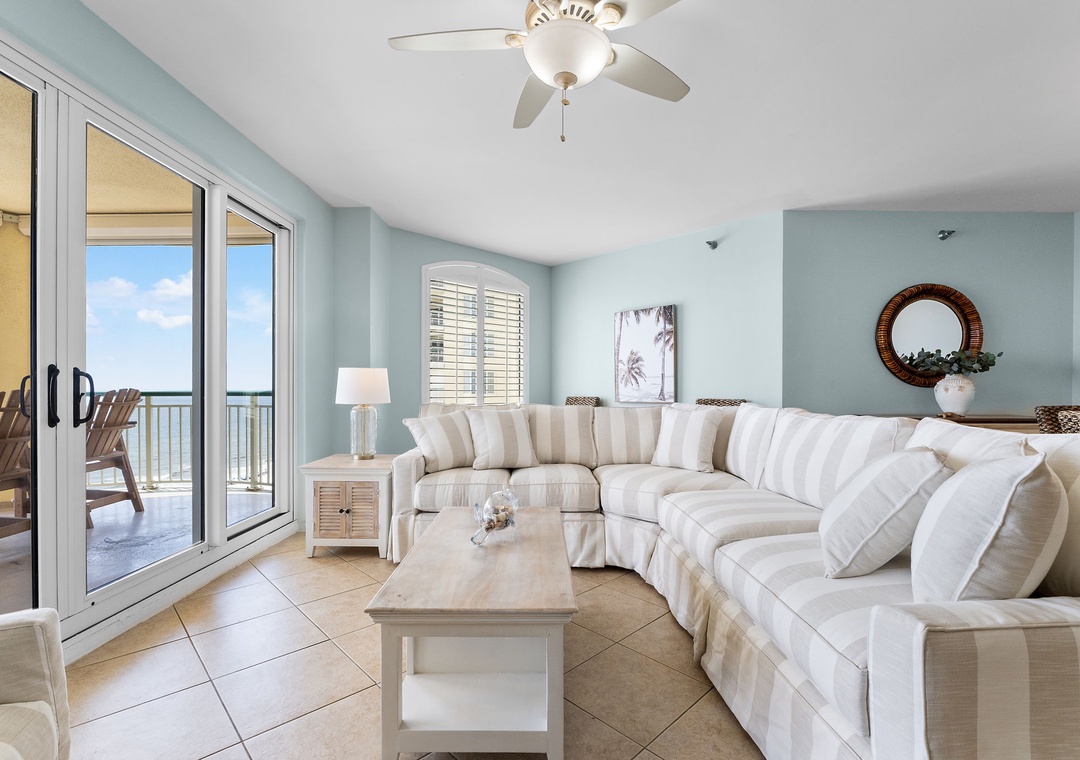 Beach Colony Tower 10C- Sink into plush coastal comfort while brilliant water views stretch beyond your glass doors—a breezy retreat bathed in light and ocean air.