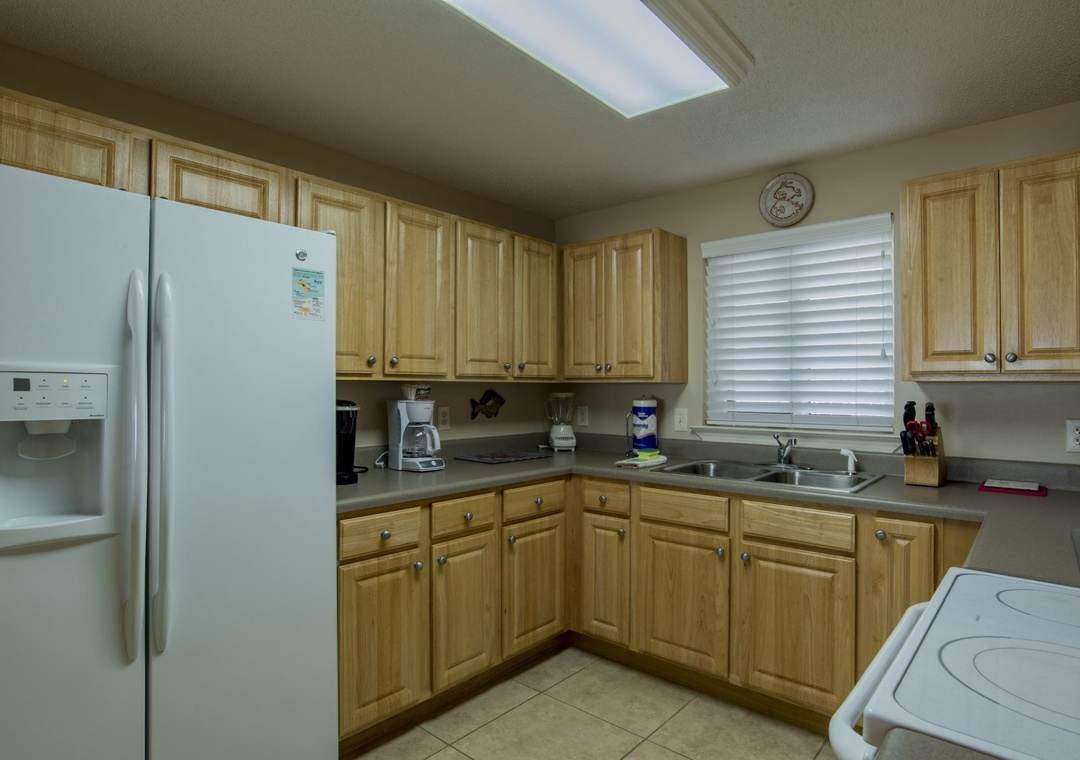Sandy Key 235 Kitchen Counters, Sink, and Refrigerator