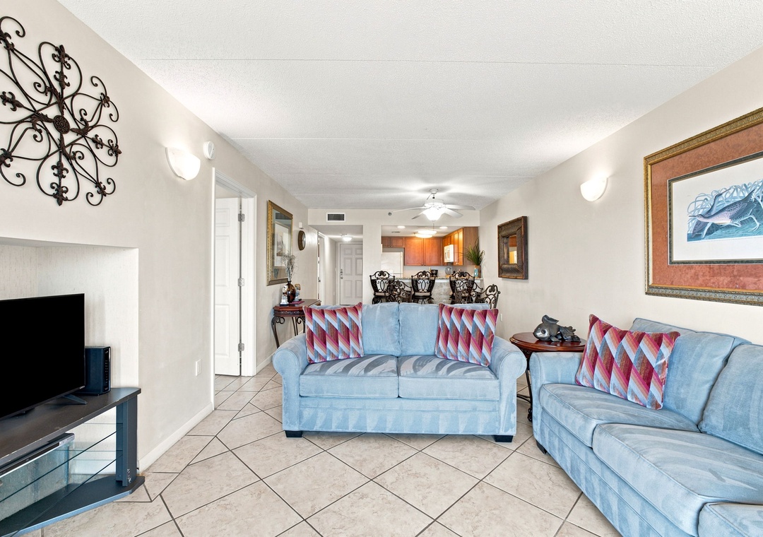 Ocean Breeze W 105-Sink into plush blue sofas and let your vacation begin in this welcoming open-concept space with a fully equipped kitchen ready for family meals.