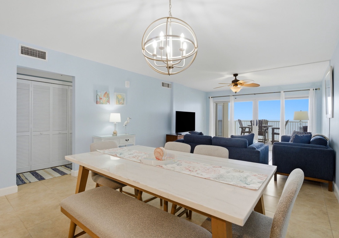 Sandy Key 637- Step into your airy, open-concept living and dining space with coastal-chic decor, where natural light streams in and your private balcony beckons with oceanfront seating.