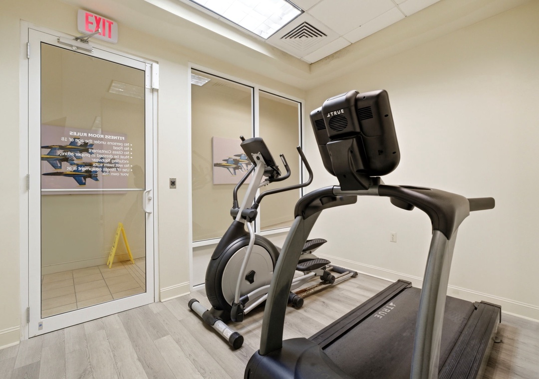 Your private fitness area awaits with cardio equipment ready for your morning routine or evening wind-down.