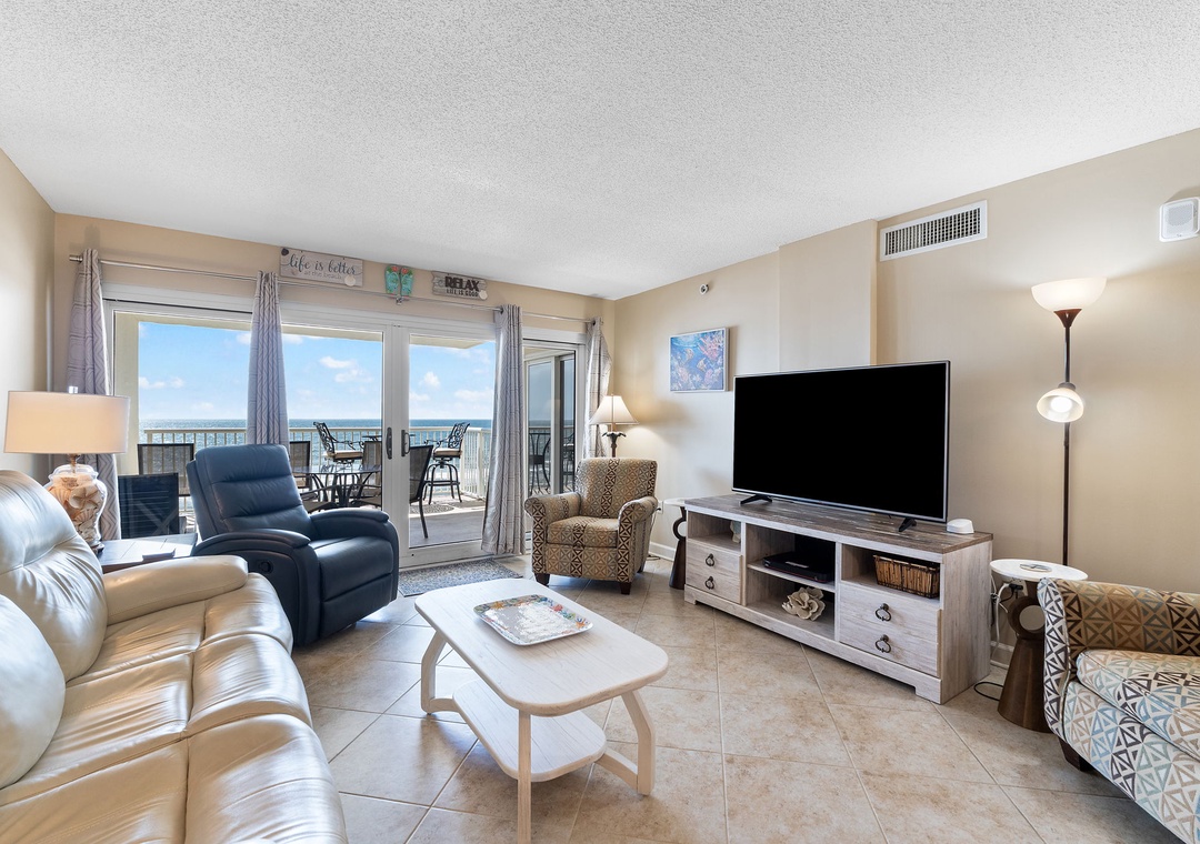 Sandy Key 628- Settle into your comfortable living room and take in stunning ocean views through the sliding glass doors. Step outside to your private balcony, where the sea breeze and endless blue horizon invite you to unwind in paradise.