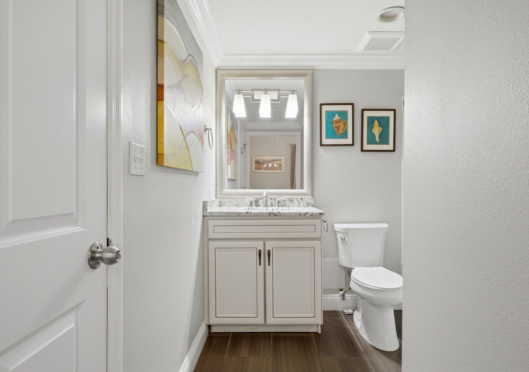 Your private bathroom features elegant marble countertops, modern lighting, and thoughtful décor—perfect for refreshing after a day of exploration.