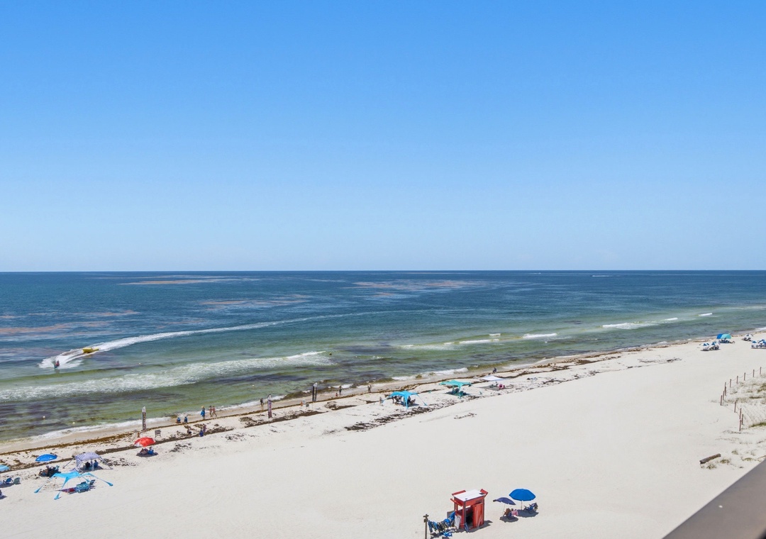 Ocean Breeze E702- Pristine sandy shores meet turquoise waters, offering a peaceful coastal escape just steps from the property.