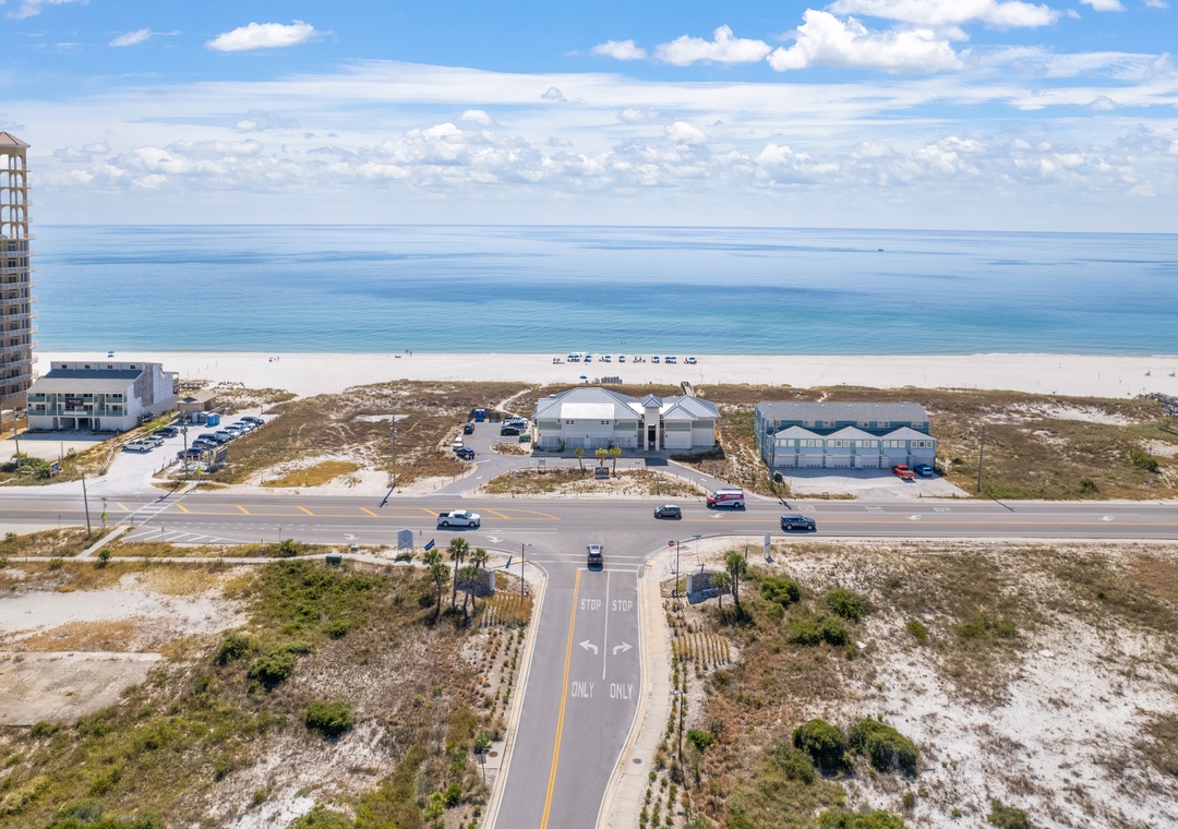 The Lost Key Beach Club Aerial view of the coastal property area, showcasing proximity to pristine white-sand beaches and the stunning turquoise Gulf waters.