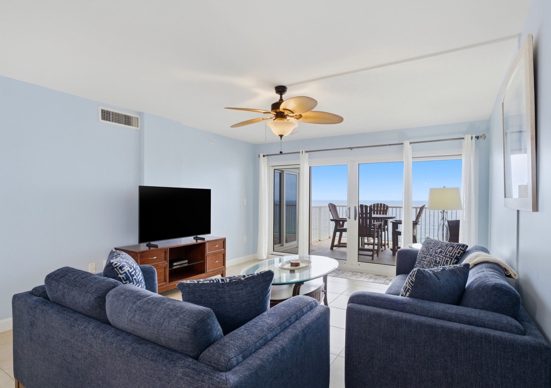 Sandy Key 637- Unwind in your light-filled living space where plush seating and ocean breezes greet you through glass doors opening to your private balcony with sweeping sea views.