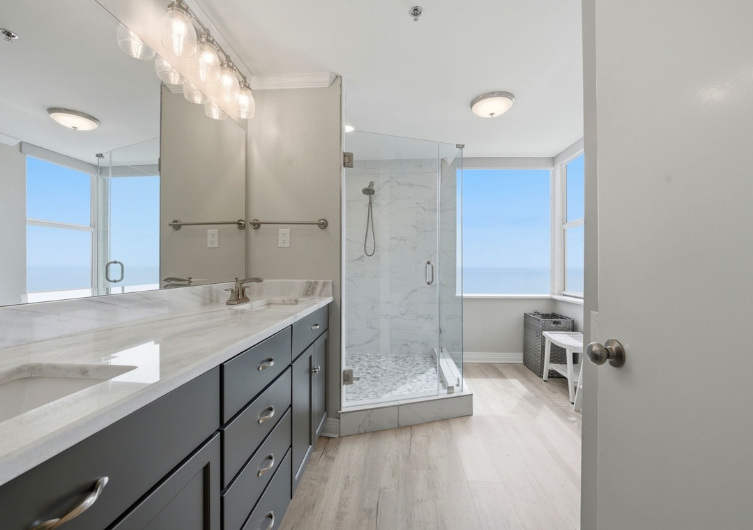 Beach Colony West 11C- Bathroom 1 Shower View & Picturesque Window Overlooking Gulf