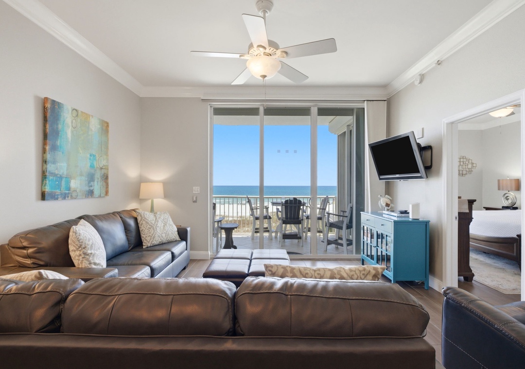 Sink into plush leather sofas and enjoy your stunning ocean view through floor-to-ceiling glass doors. Your private balcony beckons with beachfront seating and coastal breezes.